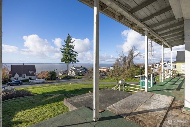 view of patio featuring a water view