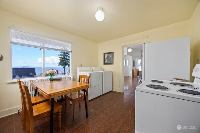 dining space featuring washing machine and dryer