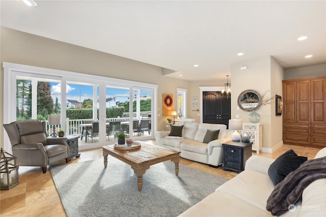 living room featuring a chandelier