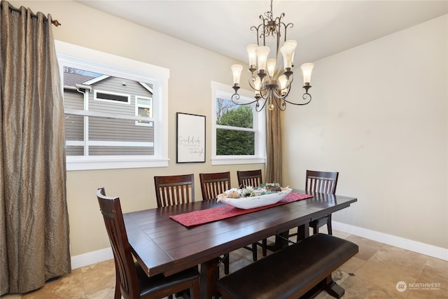 dining area with a notable chandelier