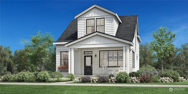 view of front of house with a porch and a front lawn