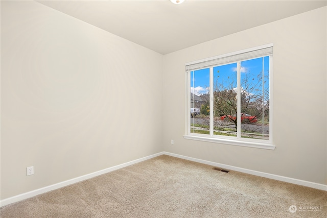 empty room with carpet floors