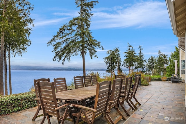 view of patio featuring a water view