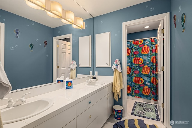 bathroom with vanity and tile patterned floors