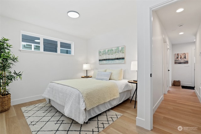 bedroom featuring light hardwood / wood-style floors