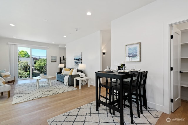 dining room with light hardwood / wood-style flooring