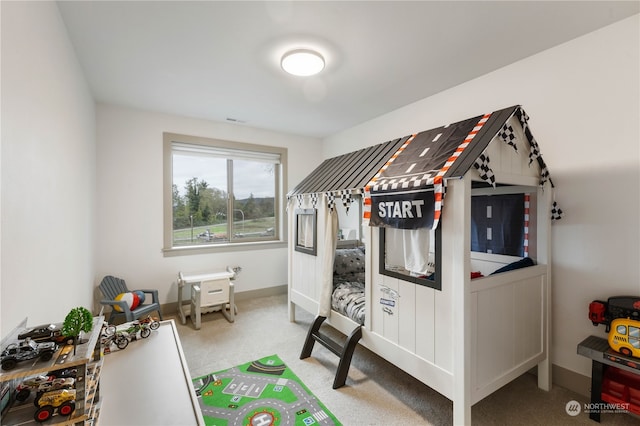 recreation room featuring carpet flooring