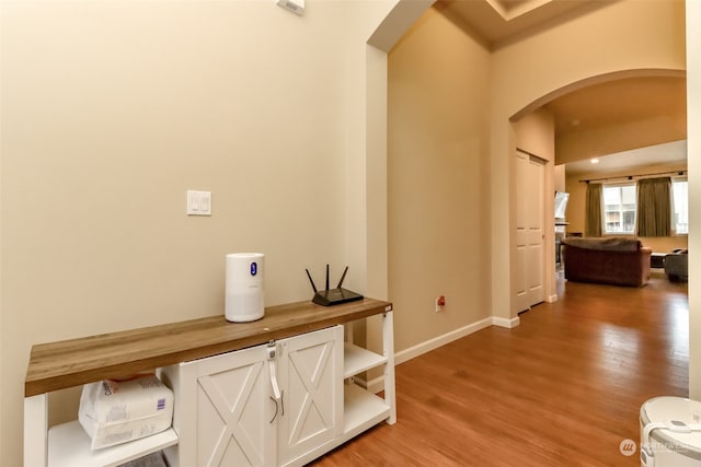 corridor featuring light hardwood / wood-style floors