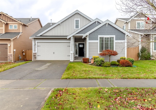 craftsman-style house with a front lawn