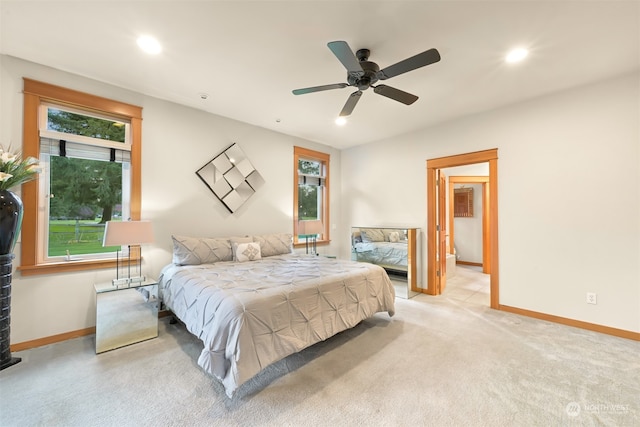 carpeted bedroom with ceiling fan