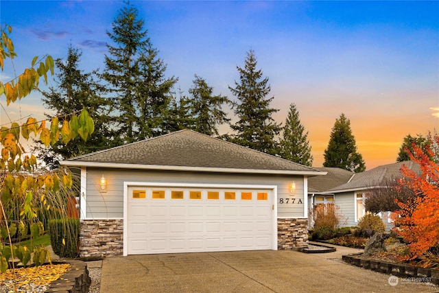 view of front of property featuring a garage