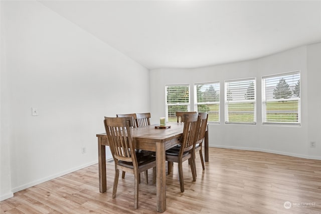 dining space with light wood-type flooring