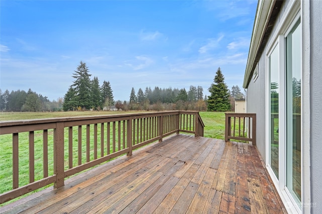 wooden deck with a yard