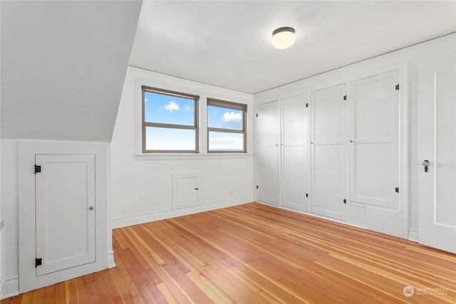 bonus room featuring light hardwood / wood-style floors