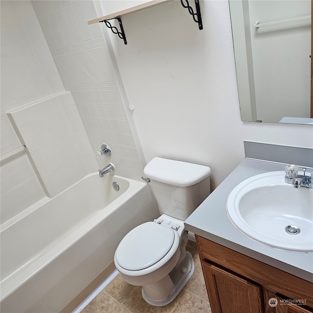 full bathroom featuring tile patterned flooring, vanity, toilet, and shower / washtub combination