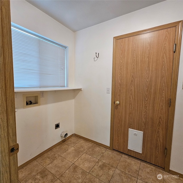 laundry area with washer hookup, electric dryer hookup, and light tile patterned floors