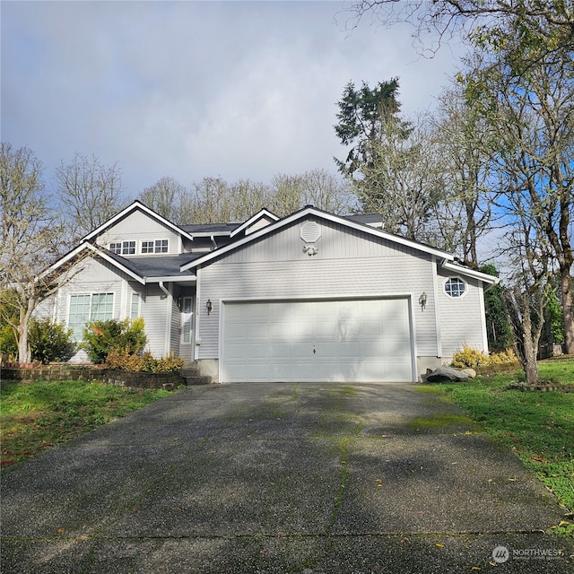 view of front of property featuring a garage