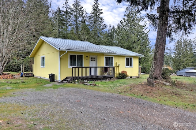 ranch-style house with a deck