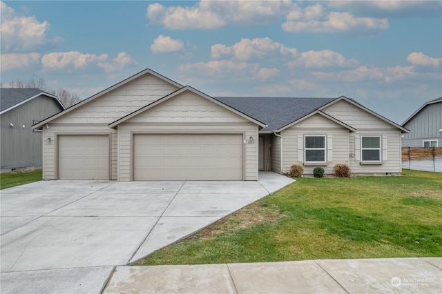 ranch-style house with a front yard and a garage