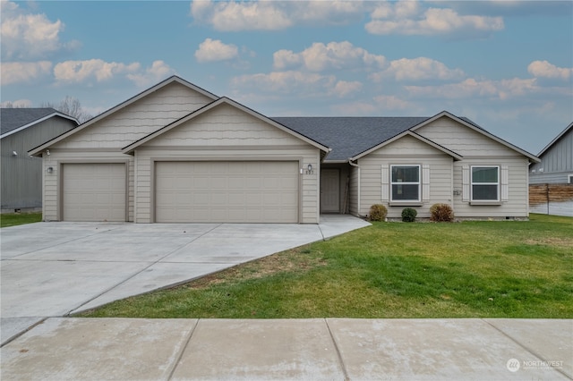 ranch-style house with a front yard and a garage