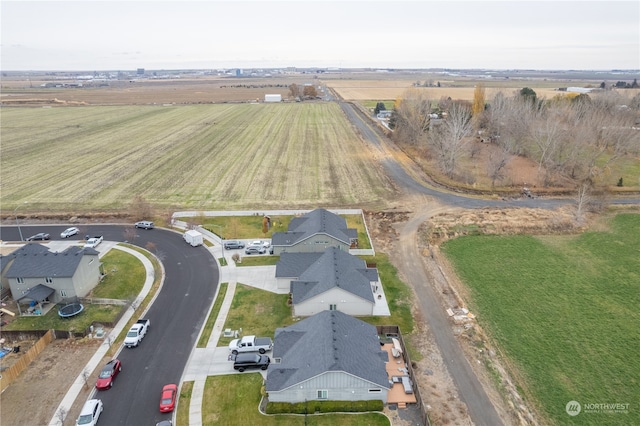 birds eye view of property featuring a rural view