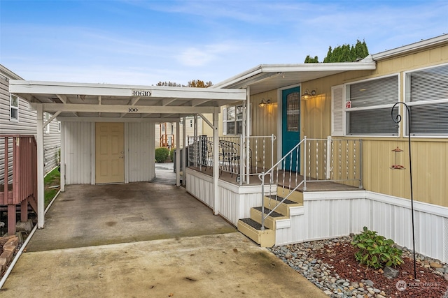 entrance to property with a carport