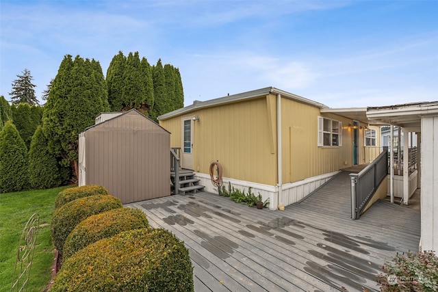 wooden terrace featuring a storage shed