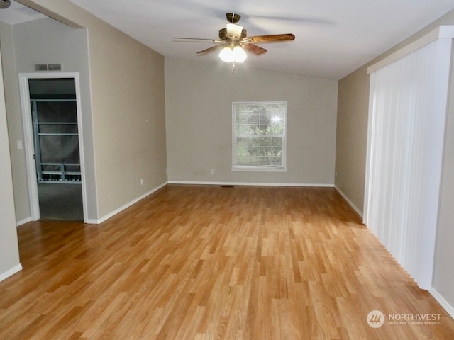 2722 S 371st St, Federal Way, WA 98003 - empty room featuring ceiling fan, lofted ceiling, and light hardwood / wood-style flooring