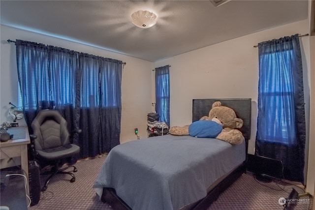 bedroom featuring carpet floors