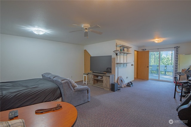 carpeted bedroom with ceiling fan and access to outside