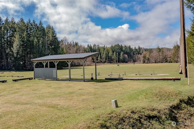 view of community featuring a lawn