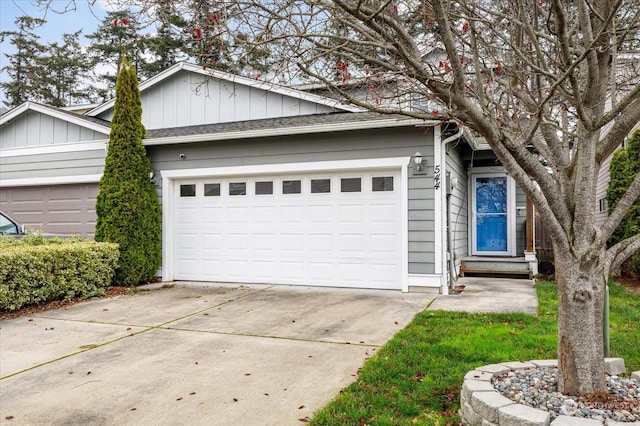 ranch-style house featuring a garage