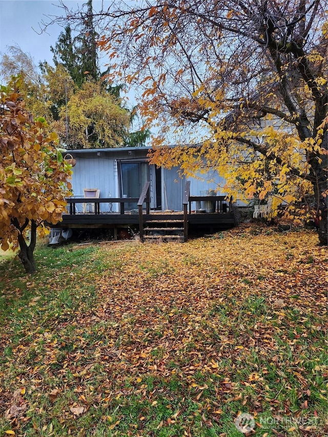 view of front of house featuring a deck