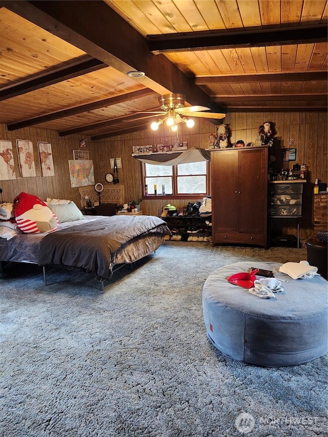 carpeted bedroom featuring beam ceiling, wood walls, and wood ceiling