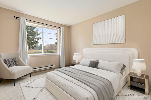 carpeted bedroom with a baseboard heating unit