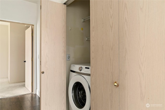 laundry room with washer / clothes dryer and dark hardwood / wood-style flooring