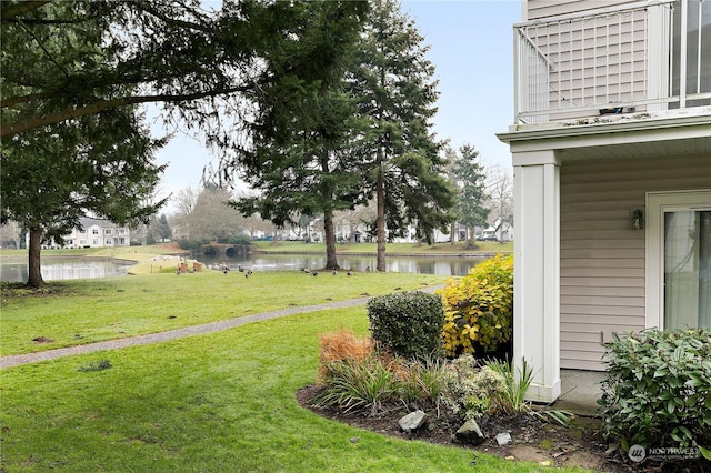 view of yard with a water view