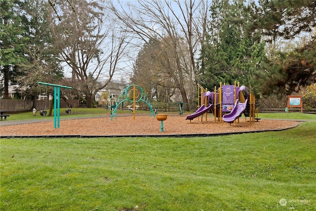 view of playground featuring a lawn