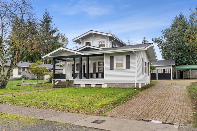 view of front of home with a carport, covered porch, and a front lawn