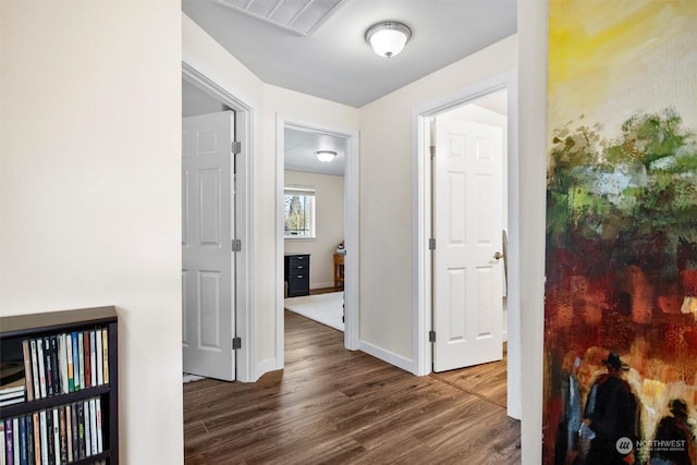 hall featuring dark wood-type flooring