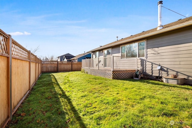 view of yard with a deck