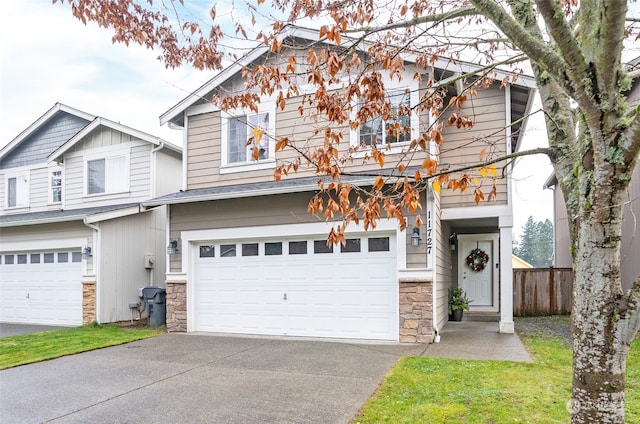 view of front of property with a garage