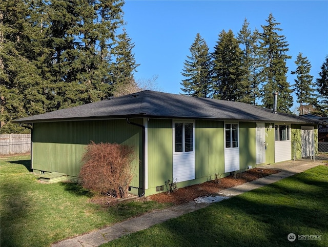 view of property exterior featuring a yard