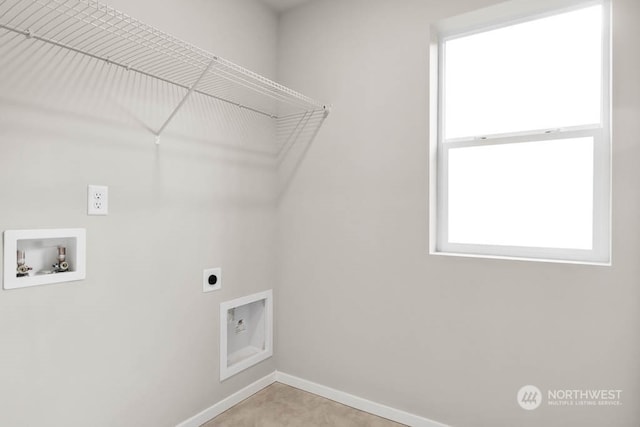 clothes washing area with washer hookup, electric dryer hookup, and light carpet