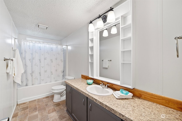 full bathroom featuring shower / tub combo, vanity, a textured ceiling, and toilet