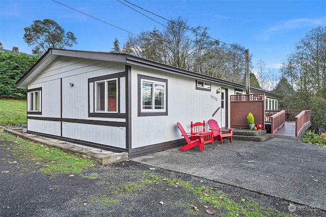 view of property exterior featuring a patio