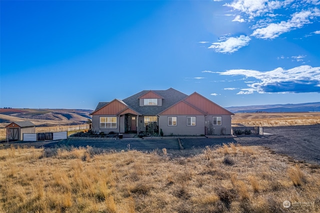 view of front facade featuring a mountain view