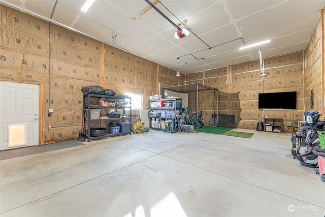 garage featuring a garage door opener