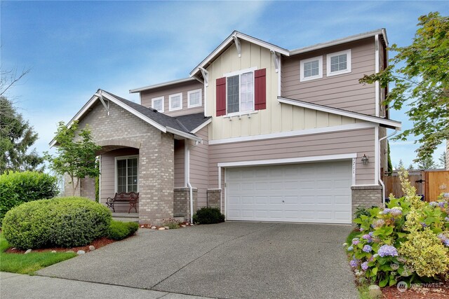 craftsman house with a garage