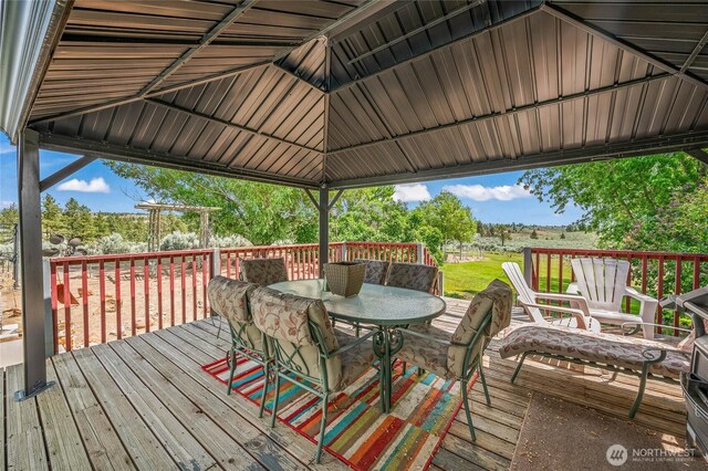 16161 Badger Mountain Rd, East Wenatchee, WA 98802 - wooden deck featuring outdoor dining area and a gazebo